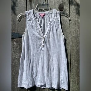 Lilly Pulitzer white sleeveless with gold buttons.